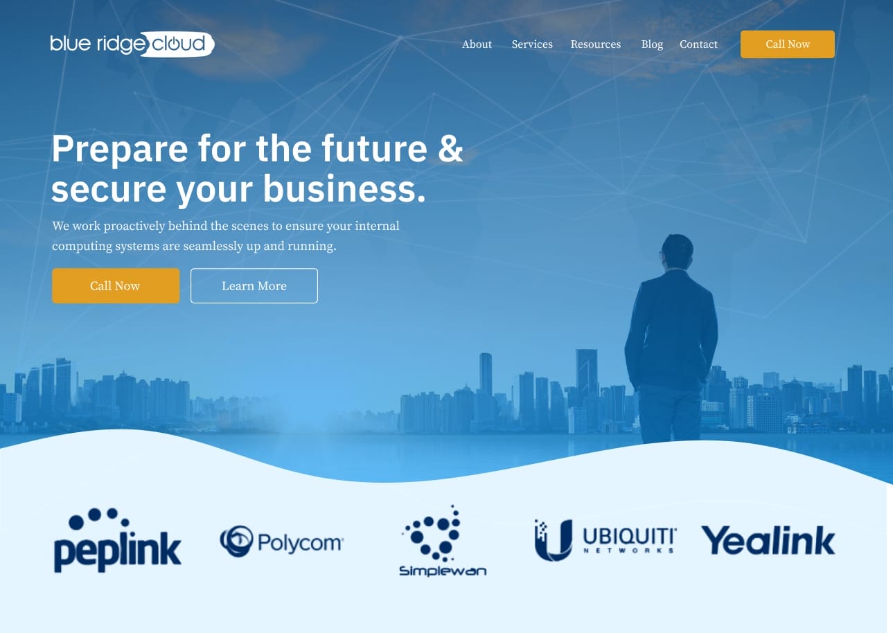 A website with a man standing in front of a building.